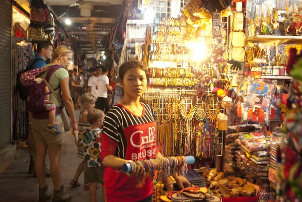 Stall attendant at Psah Chas, Siem Reap, Cambodia. Image courtesy of Mike Aquino.